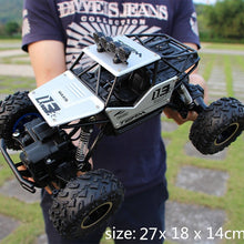 Load image into Gallery viewer, 1:12 4WD RC Cars Updated Version 2.4G Radio Control RC Cars Toys Buggy 2017 High speed Trucks Off-Road Trucks Toys for Children