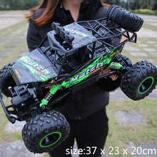 Load image into Gallery viewer, 1:12 4WD RC Cars Updated Version 2.4G Radio Control RC Cars Toys Buggy 2017 High speed Trucks Off-Road Trucks Toys for Children